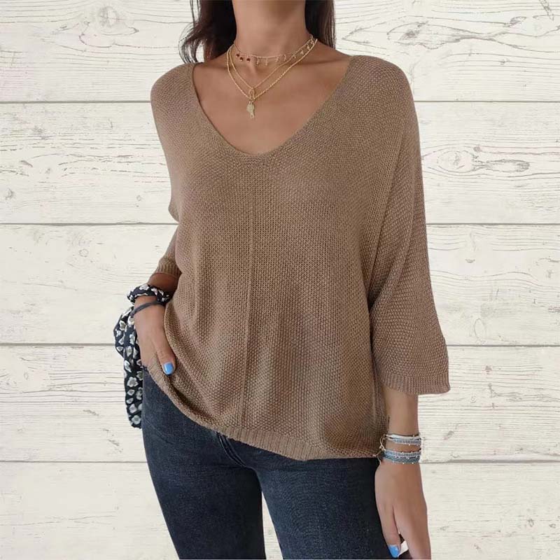 Top tricoté uni pour femme avec col en V et manches chauve-souris