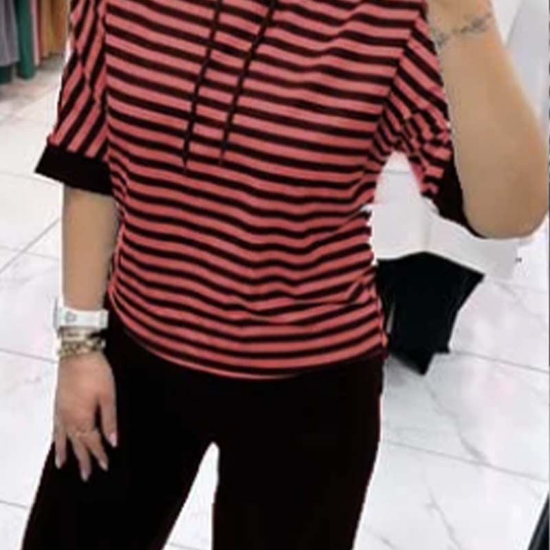Ensemble pour femme composé d'un haut rayé et d'un pantalon uni