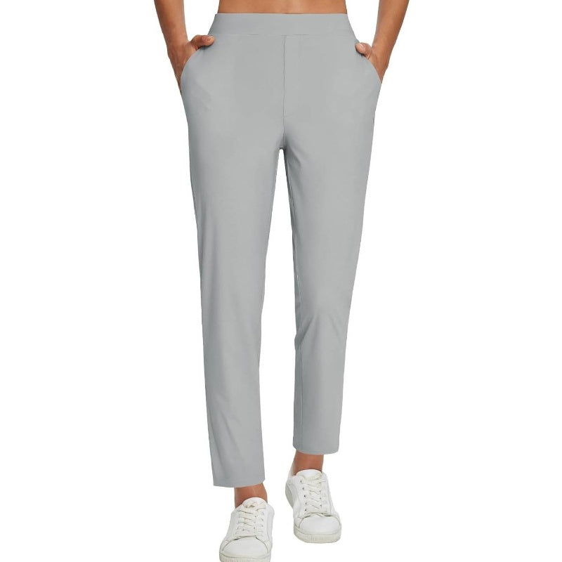 Pantalon élastique à taille haute avec poches zippées pour femmes