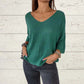 Top tricoté uni pour femme avec col en V et manches chauve-souris