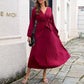 Robe pour femmes longue à plis avec ceinture nouée enveloppante