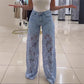 Jeans en denim patchwork avec dentelle à la mode
