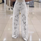 Jeans en denim patchwork avec dentelle à la mode