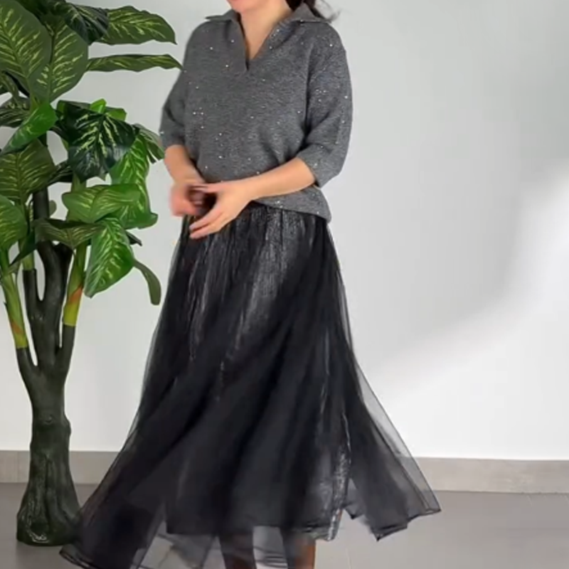 Ensemble 2 pièces pour femme composé d'un haut scintillant et d'une jupe en maille