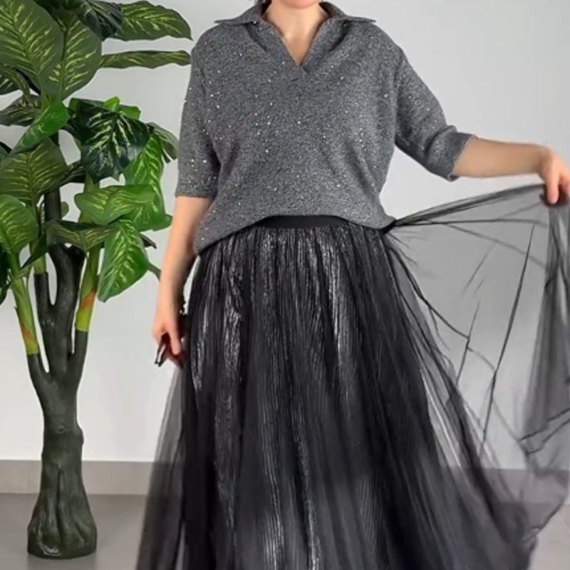 Ensemble 2 pièces pour femme composé d'un haut scintillant et d'une jupe en maille