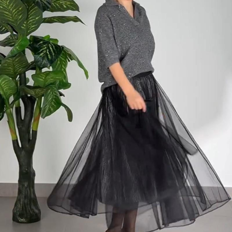 Ensemble 2 pièces pour femme composé d'un haut scintillant et d'une jupe en maille