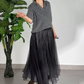 Ensemble 2 pièces pour femme composé d'un haut scintillant et d'une jupe en maille