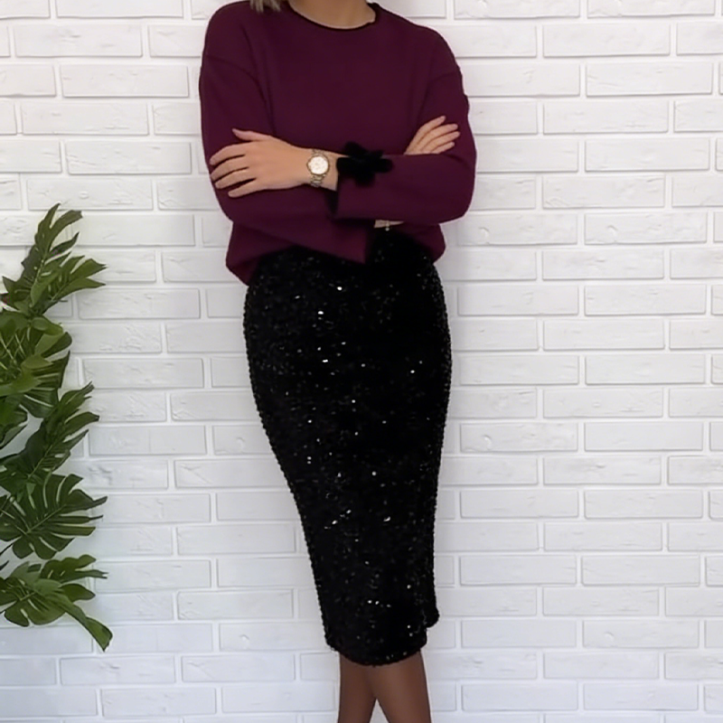 Ensemble élégant composé d'un haut à manches bouffantes et d'une jupe à paillettes