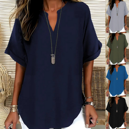 👚60 % DE RÉDUCTION ! 🔥Top ample à manches courtes tendance – Col en V cranté, ourlet asymétrique et tissu léger (5 couleurs, tailles S à 2XL) 🌸