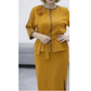 Ensemble pour femme composé d'un haut à basque avec ceinture et d'une jupe crayon