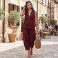 Ensemble composé d'un chemisier sans manches croisé et d'un pantalon à jambes larges