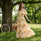 Robe longue à volants et épaules dénudées, imprimé floral estival