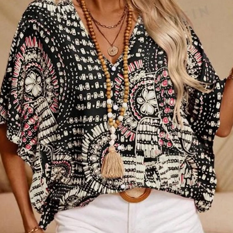 👚 50% DE RÉDUCTION 🌸 Top imprimé col V, manches dolman – Coupe large & style vacances – Léger, fluide – parfait pour l’été ou les voyages – look bohème et confortable ☀️🌿✨