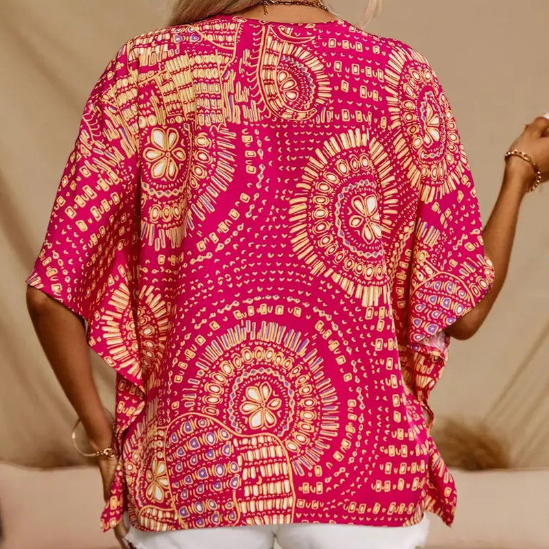 👚 50% DE RÉDUCTION 🌸 Top imprimé col V, manches dolman – Coupe large & style vacances – Léger, fluide – parfait pour l’été ou les voyages – look bohème et confortable ☀️🌿✨
