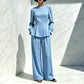 Ensemble élégant pour femme composé d'un haut à manches bouffantes et d'un pantalon à jambes larges