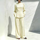 Ensemble élégant pour femme composé d'un haut à manches bouffantes et d'un pantalon à jambes larges