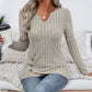 Haut en maille à col en V et ourlet asymétrique pour femme